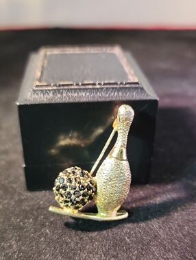Gold-Tone Bowling Pin Brooch with Black Crystal Ball